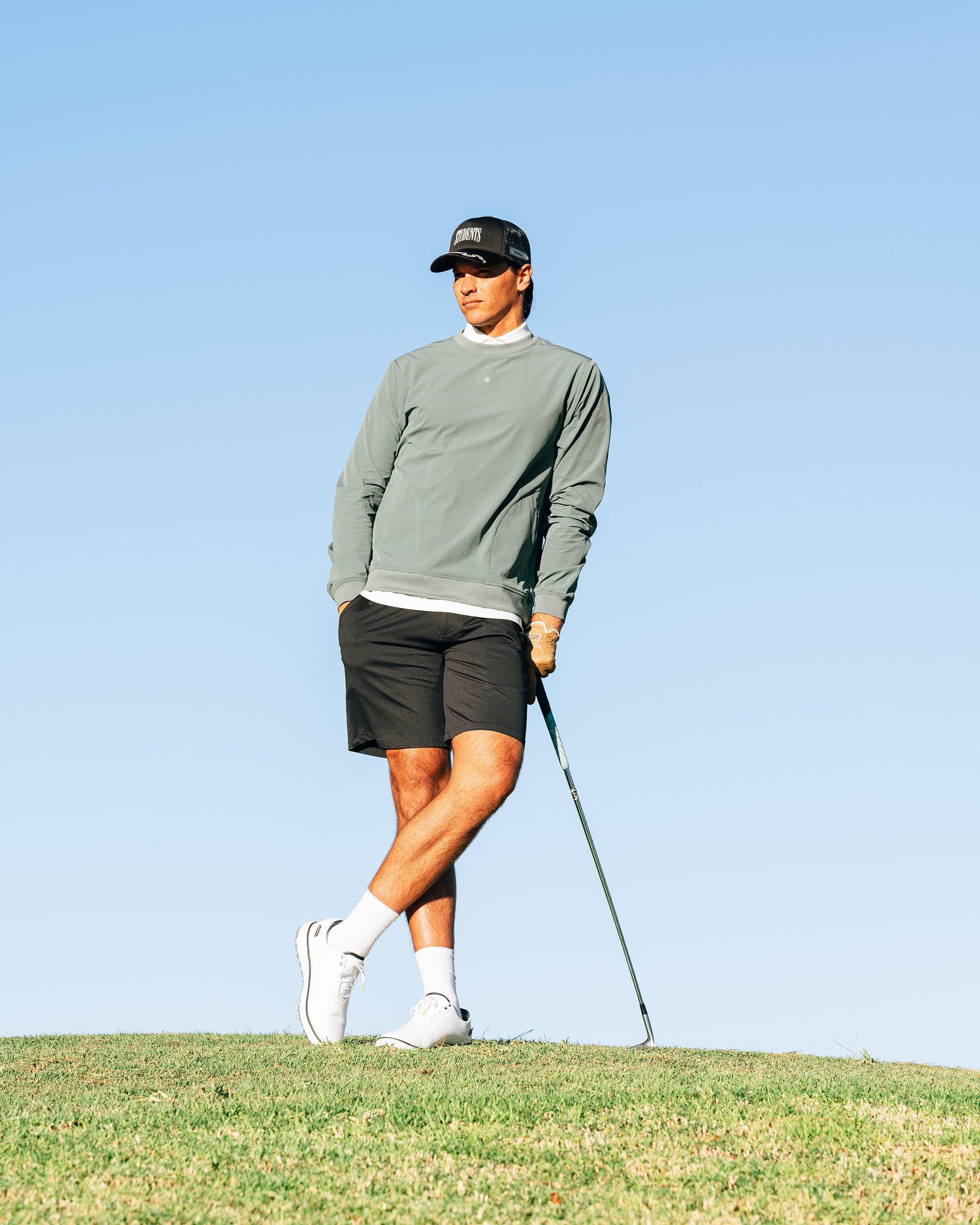 Person playing golf on a clear day